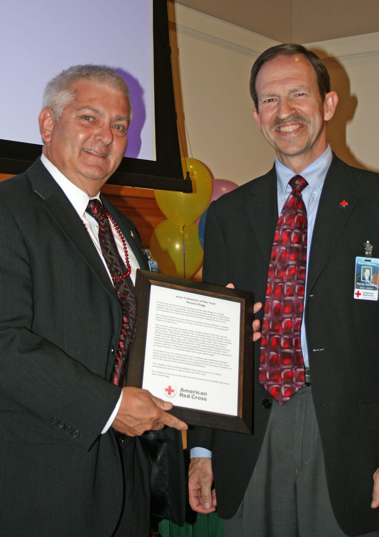 Fourth Plain Village: Dennis Rugg, left, was named Volunteer of the Year by the American Red Cross Southwest Washington chapter.