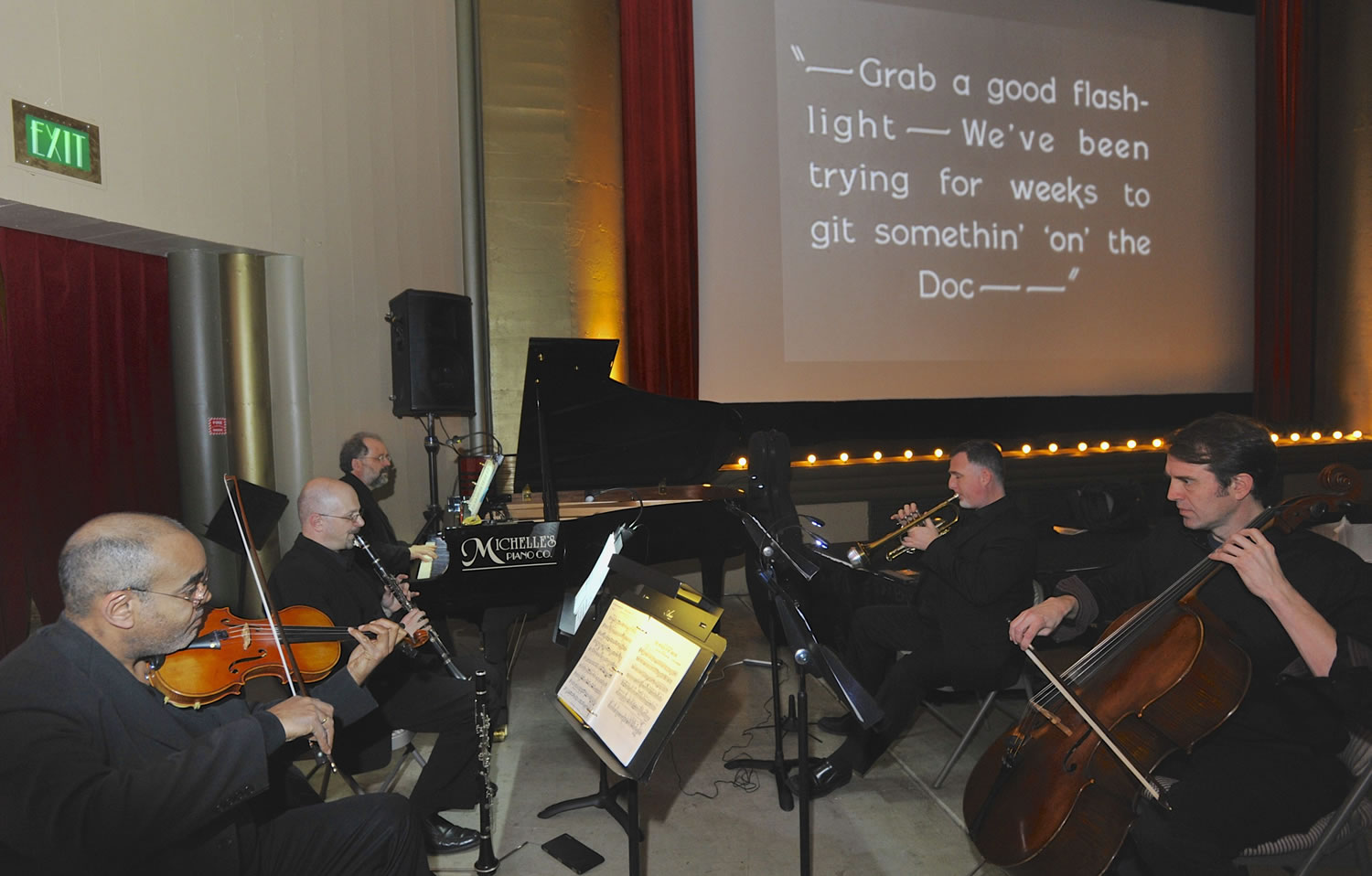 Vancouver Symphony Orchestra musicians accompany a silent film comedy Sunday afternoon at Kiggins Theatre in Vancouver.
