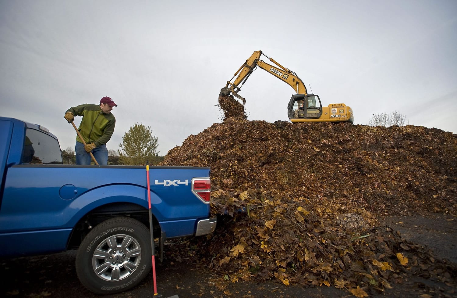 Brian Galbreth of the Ellsworth neighborhood dumps his fourth and final truckload of leaves at H&amp;H Wood Recyclers on Sunday. Galbreth said the free program allowed him to dispose of perhaps 1,500 pounds of leaves.
