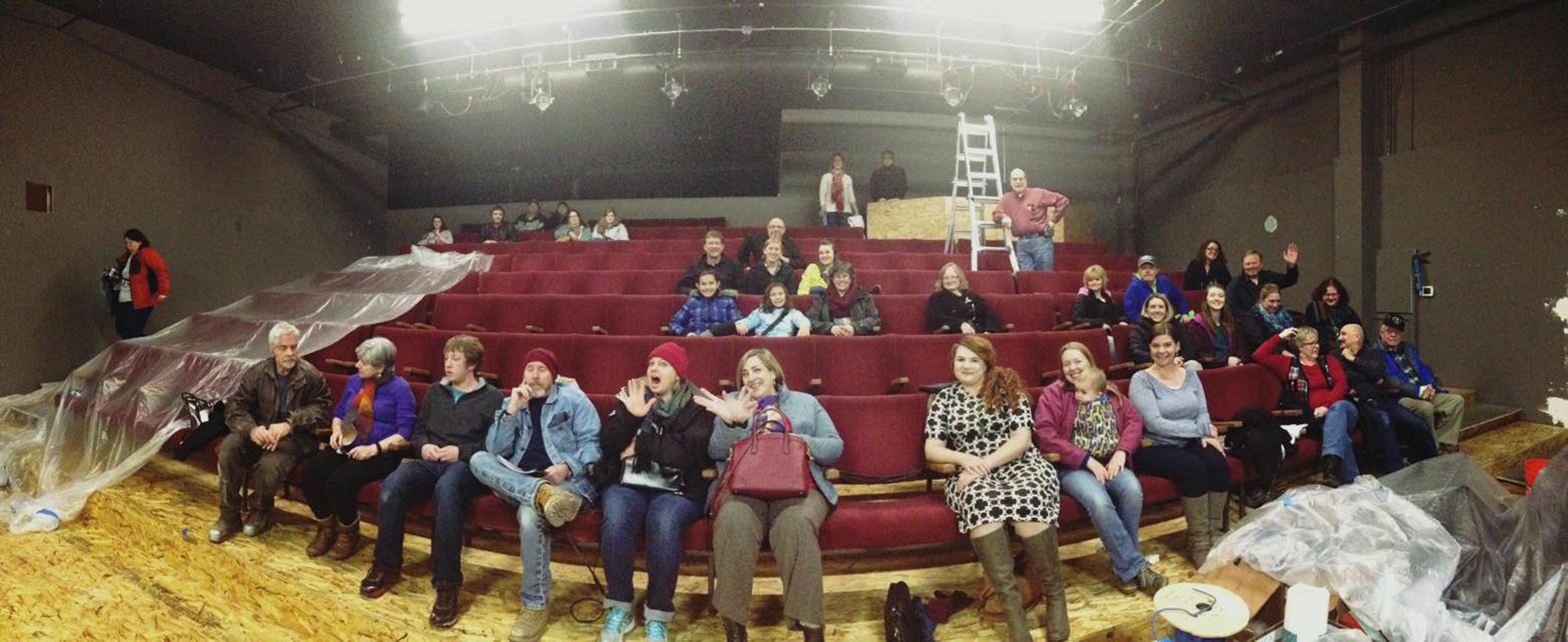 A panoramic view of the new stadium seating -- and some of the volunteers -- at the new Magenta Theater.