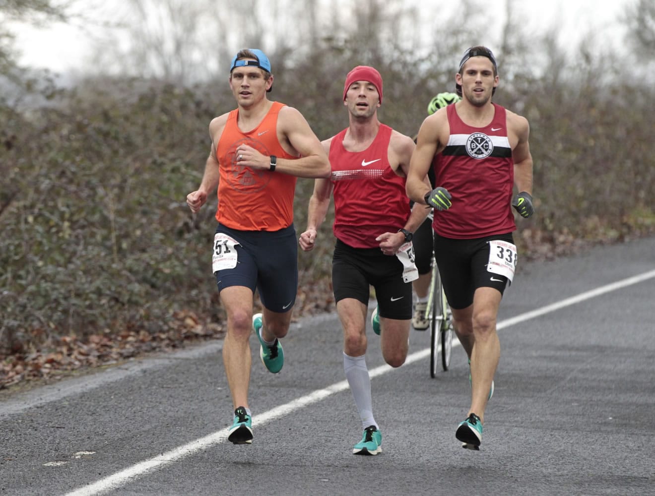 Left to right, Patrick Reaves, Peter Bromka, and Chris Platano run together at the Vancouver Lake Half Marathon.