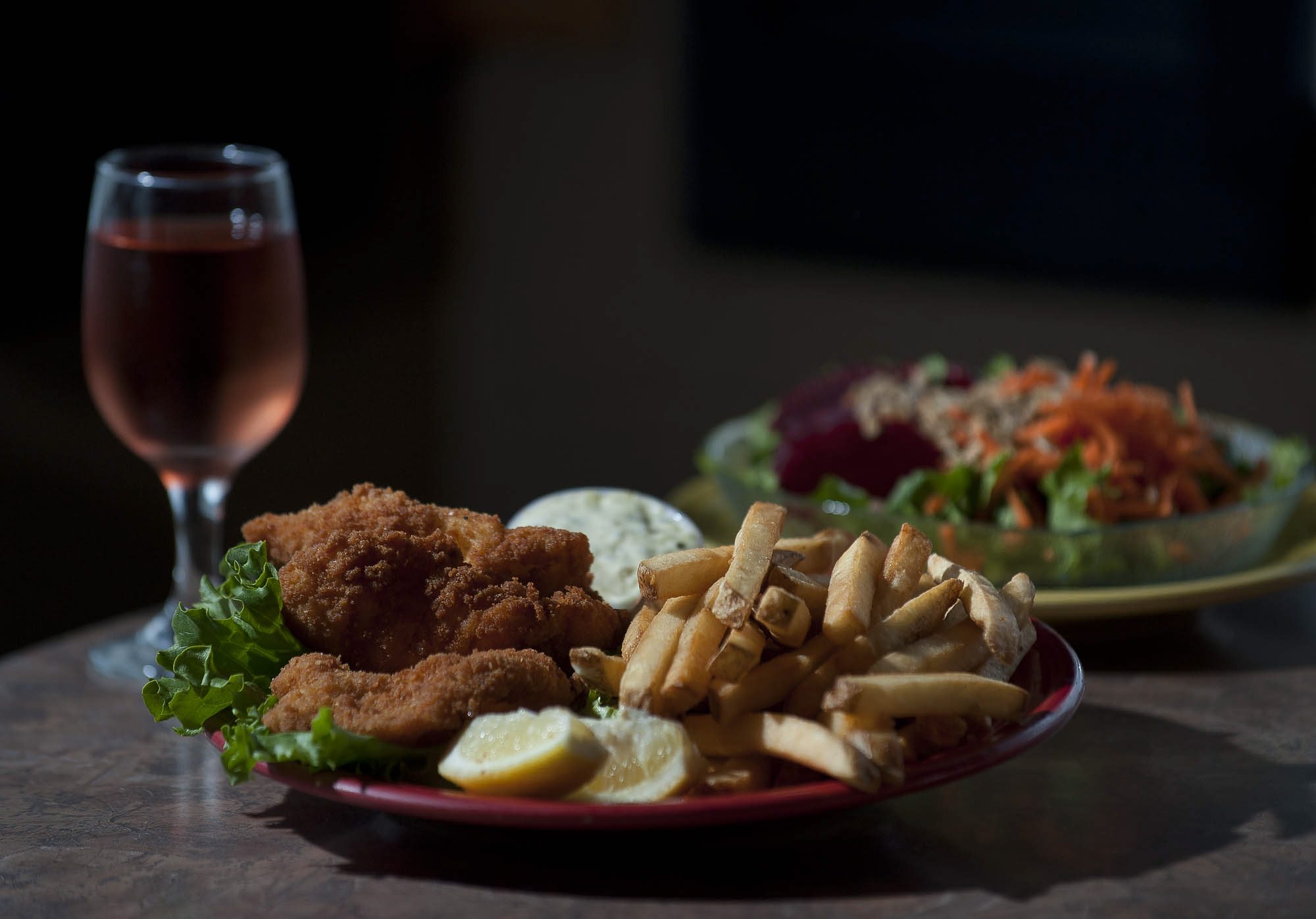 Fish and chips and a green salad are offered at Julie's Cottage Kitchen on Northeast 72nd Avenue.