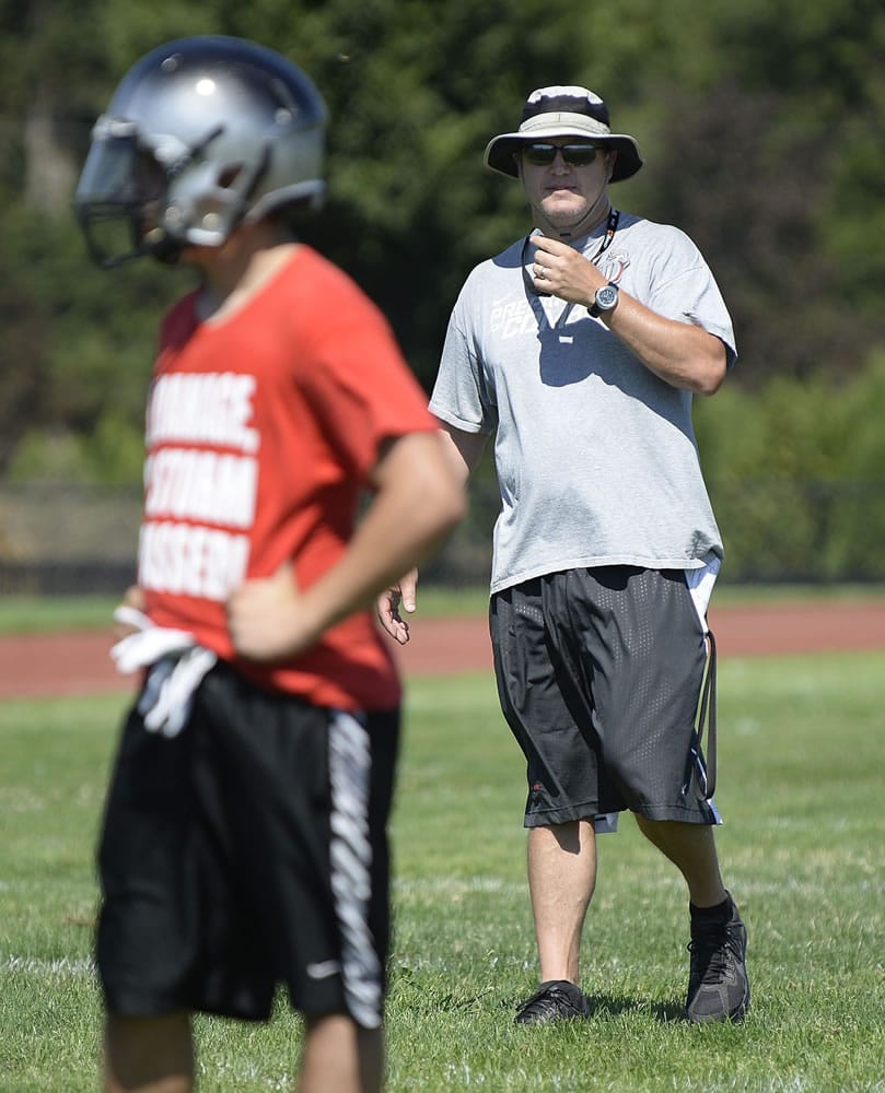 Union High School head coach Gary McGarvie keeps an eye on practice Wednesday afternoon, August 19, 2015 at the school's practice field.