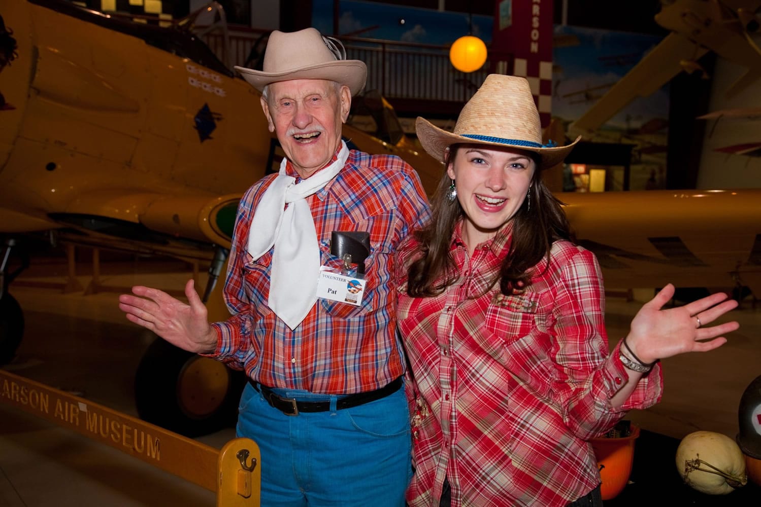 Hudson's Bay: Pat Sutherland, left, a volunteer at the Pearson Air Museum, and Nicole Knotts, an employee at the Fort Vancouver visitor center bookstore, pose at Pearson's Aviation Harvest Day celebration on Oct.