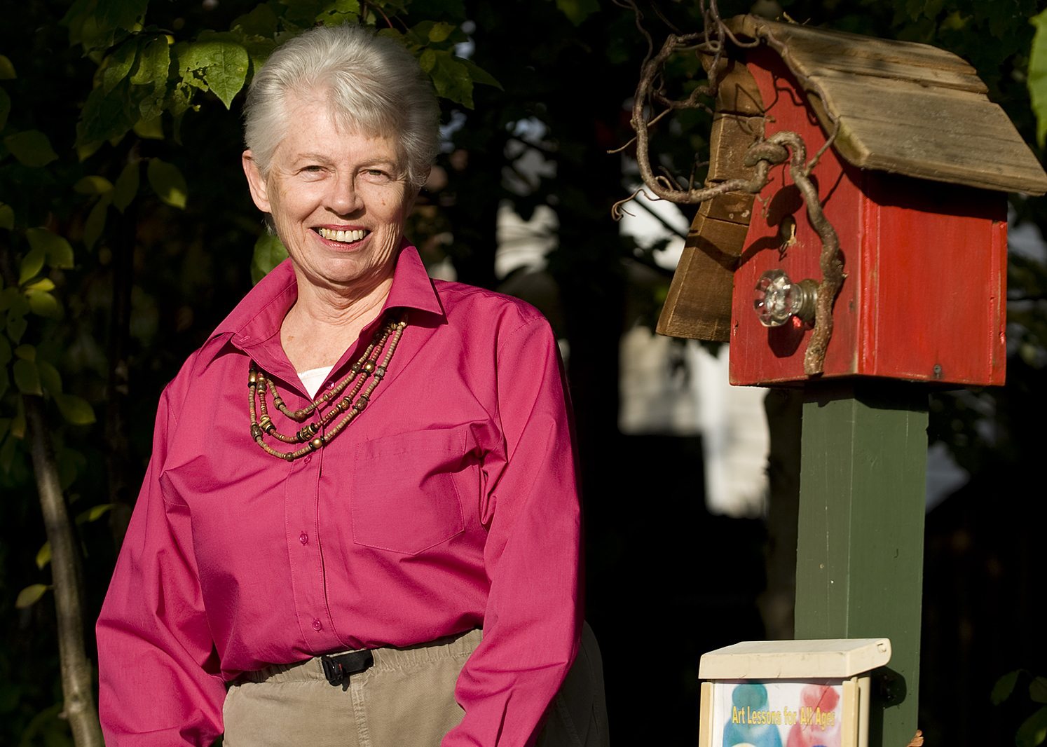 Artist Kathy Winters, shown, Thursday, November 3, 2011, has helped organize a movement in Ridgefield to put up word houses, bird houses with a box to put art, stories, poetry, etc.