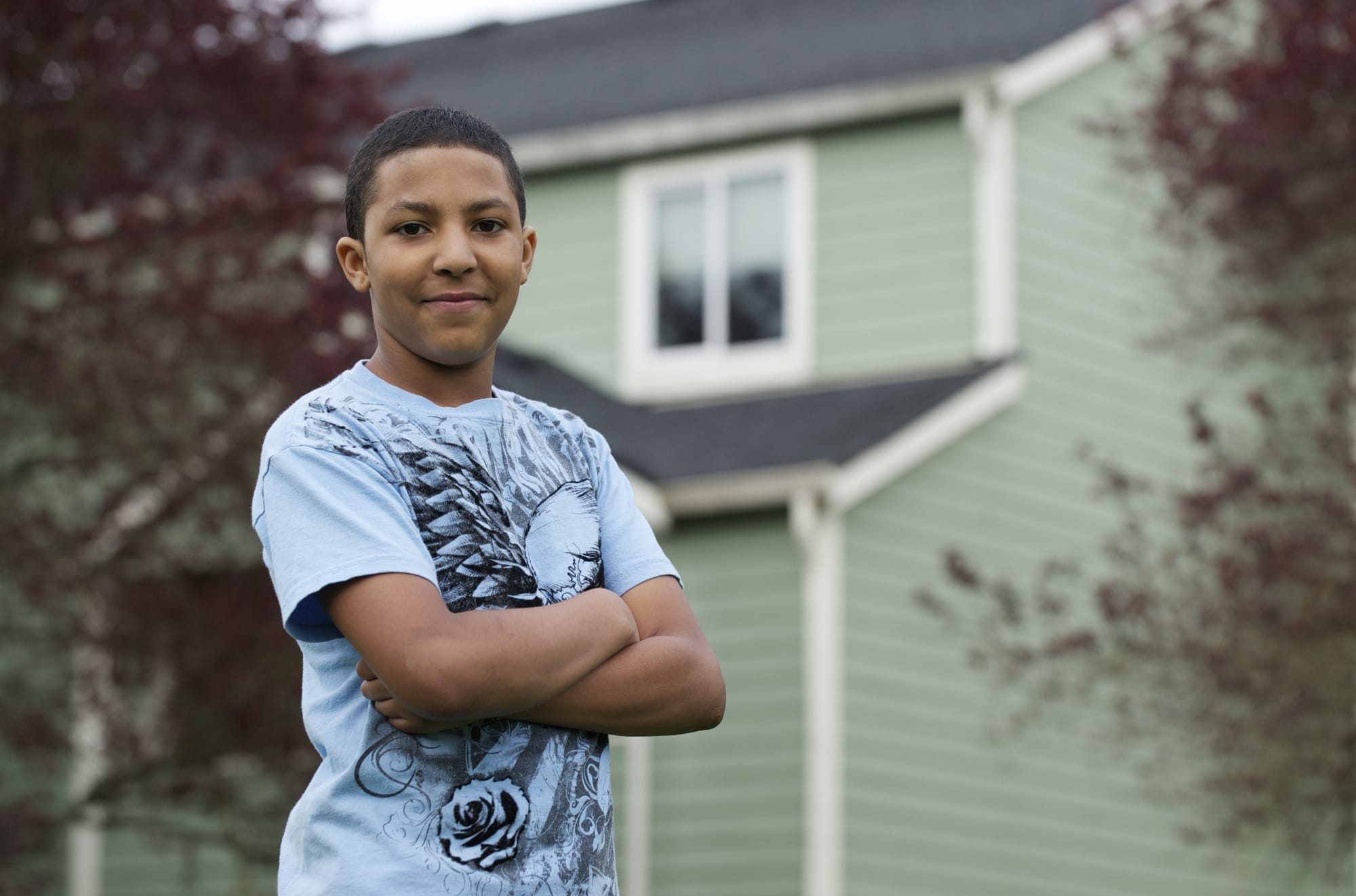 Damon Davenport, 13, is credited with rescuing an 18-month-old boy from the roof of an apartment at the Prairie View Apartments in Orchards on Sunday afternoon, April 29, 2012. The toddler's 2-year-old brother fell from the roof minutes earlier but was not seriously injured.