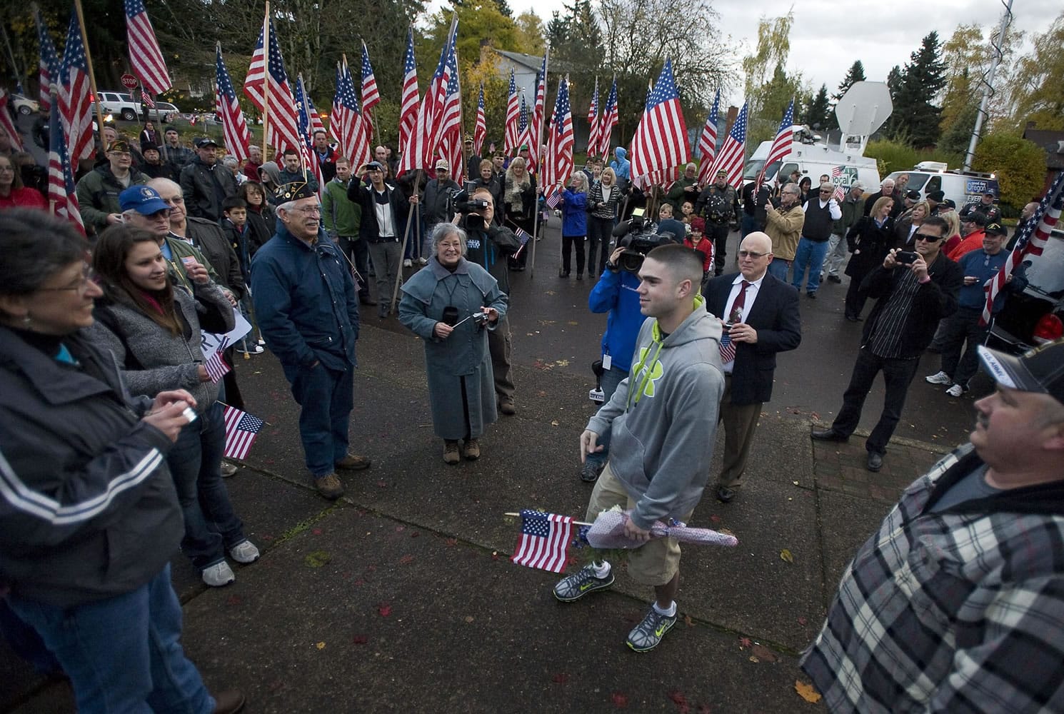Pfc. Cory Doane arrives at his Vancouver home to find a large crowd there to greet him on Friday.
