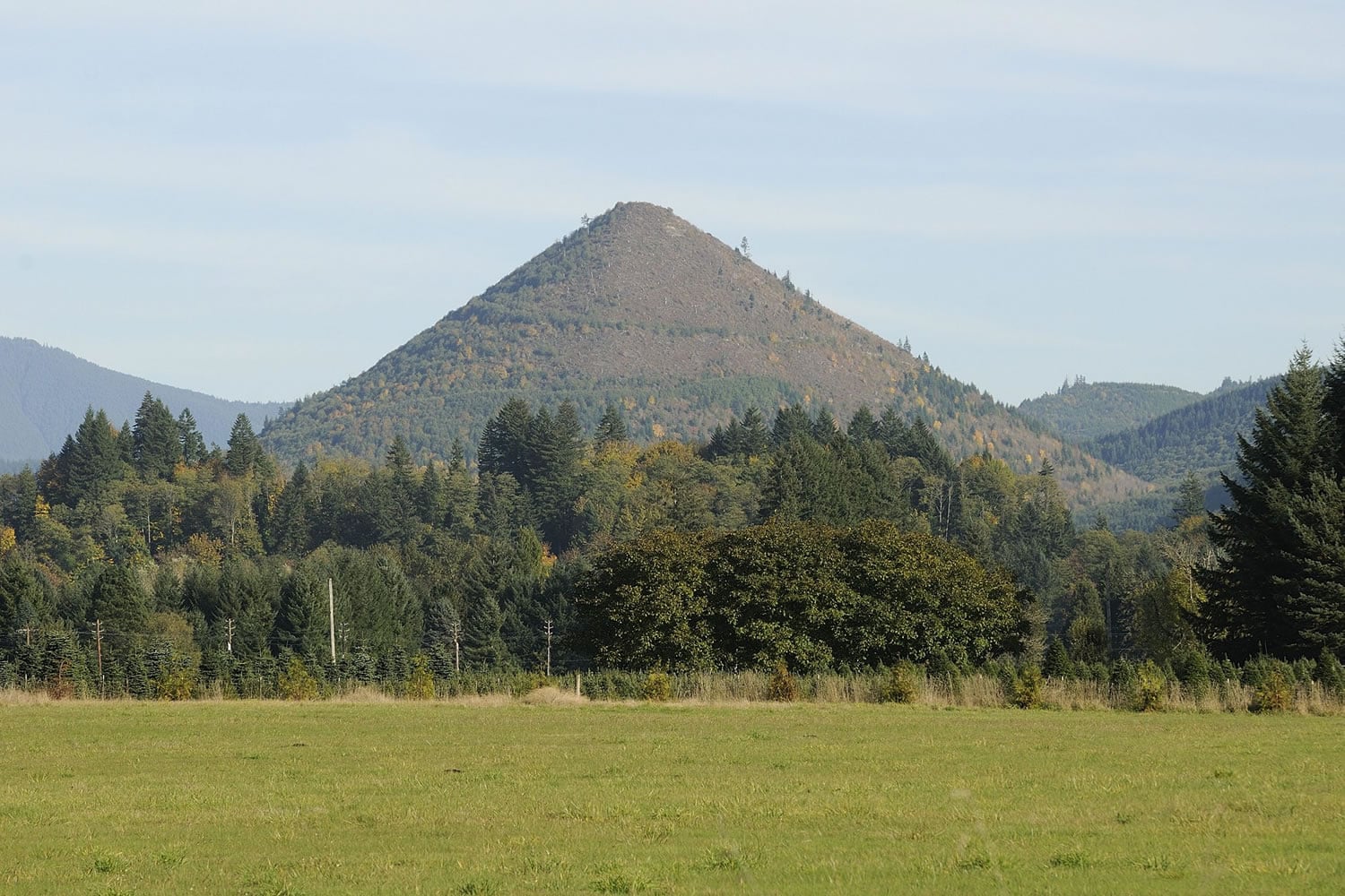 Clark County's cone-shaped Tumtum Mountain is still for sale, according to Terri Eklund, a Vancouver real estate agent who is listing the site.