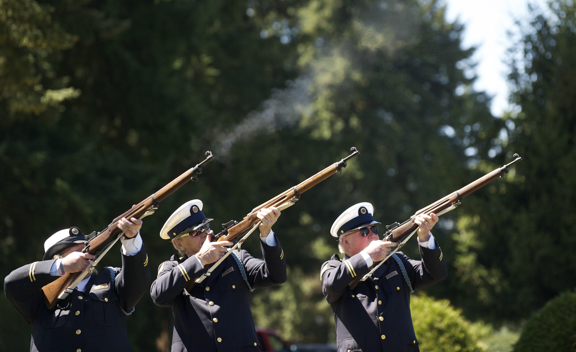 Members of Post 122, from left, Gail Branum, Harlee Horell and Jim Martin, fire three volleys each Saturday during a memorial service for veterans that did not receive a full military funeral at Evergreen Memorial Gardens.