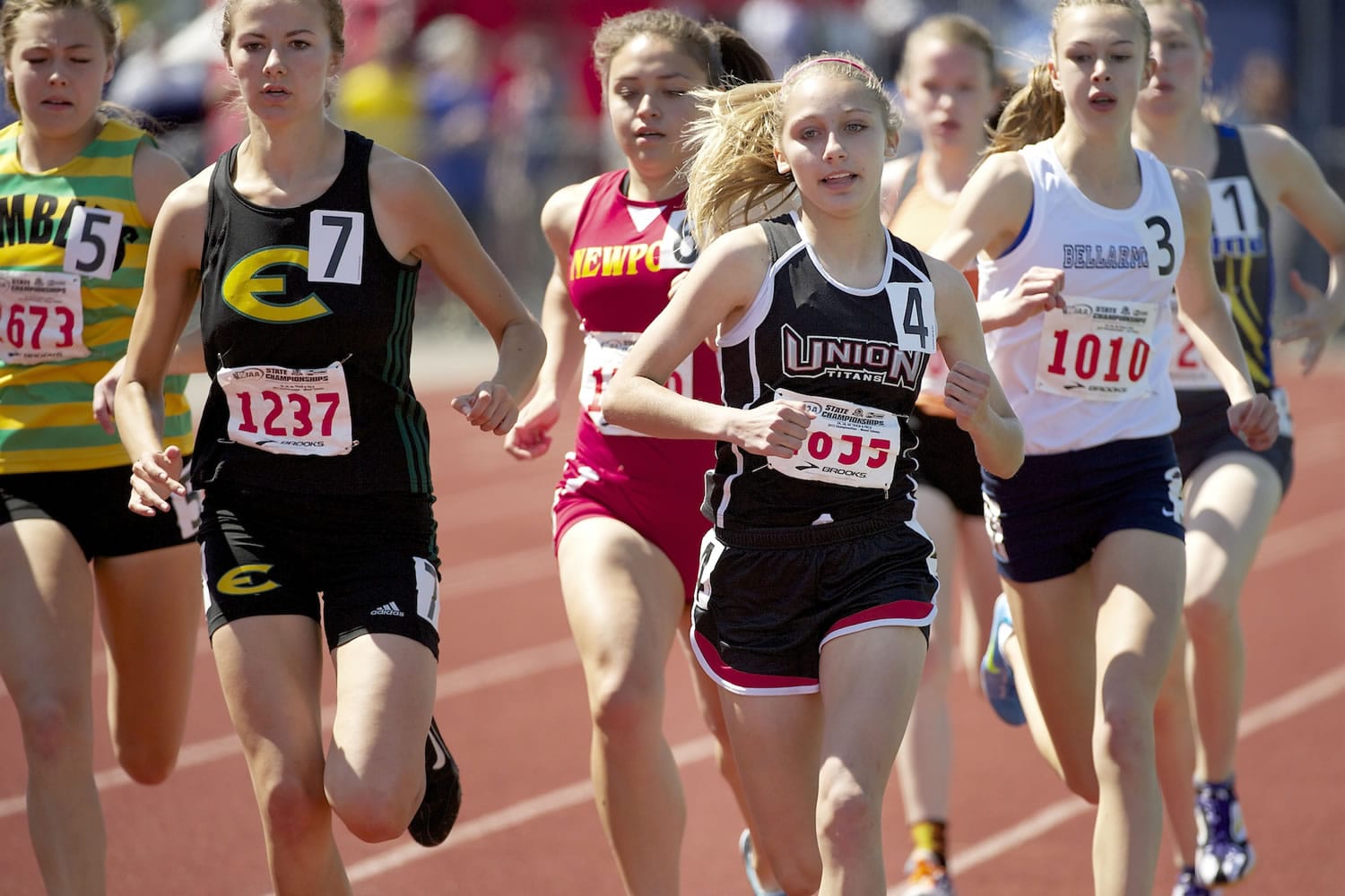 Union's Alexis Fuller, center, leads the way in the girls 800-meter race. Fuller won the event in 2:13.69.