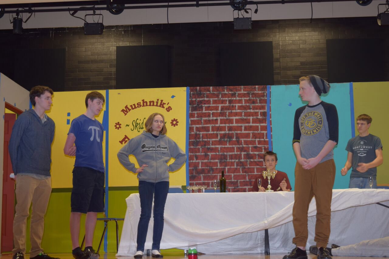Weston Gullberg (left), Daniel Humphreys, Sophia Wisely, Isaac Goin, Danny Remenar and Cairo Achterbosch rehearse a scene from &quot;Always Blame the Butler.&quot; (Hockinson High School)