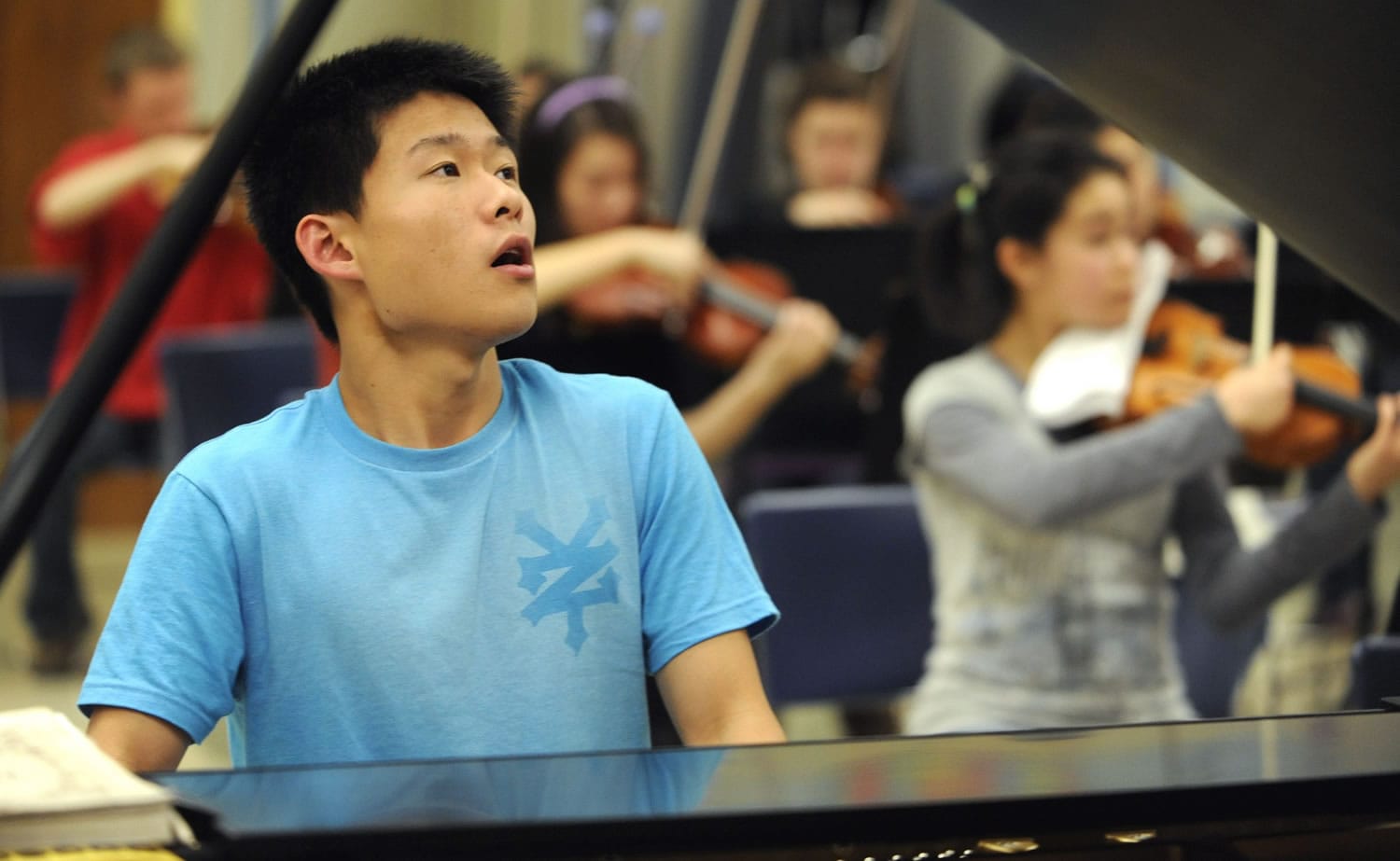 Pianist Fred Lu rehearses Beethoven's &quot;Emperor Concerto&quot; ahead of his Saturday solo at the Arlene Schnitzer Concert Hall in Portland.