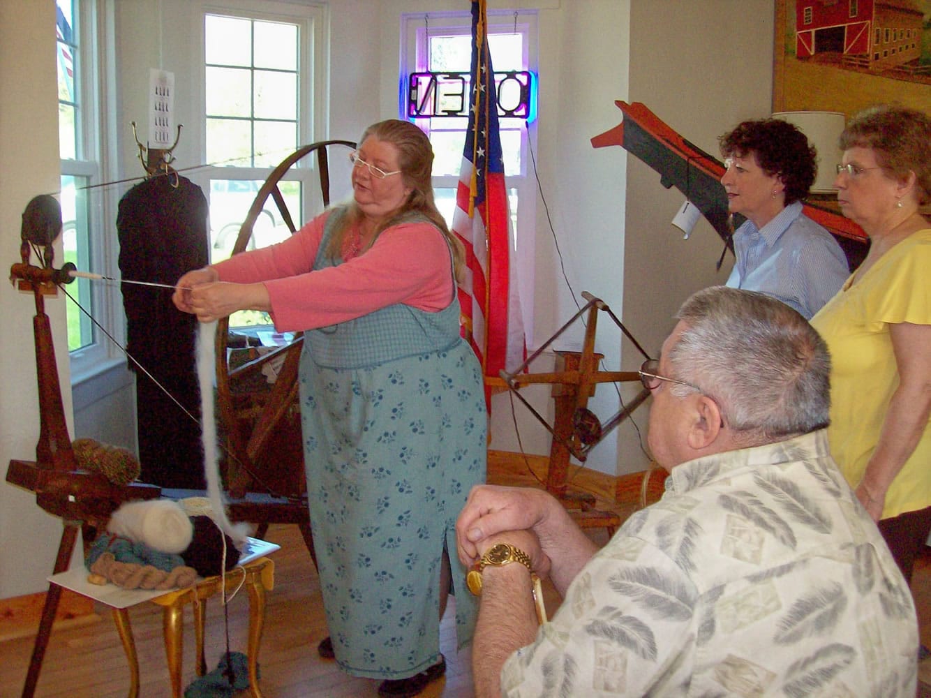 La Center: Barbara Sizemore works the historical museum's Great Spinning Wheel.
