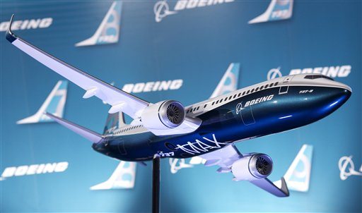 In this Aug. 30, 2011 photo, a model of the newly revealed 737-MAX passenger airplane, which feature redesigned CFM International LEAP-1B engines, is photographed in Renton, Wash. Lion Air, a large private carrier in Indonesia, ordered a total of 230 airplanes. That includes 201 of the redesigned Boeing 737 &quot;MAX&quot; and 29 extended range 737s. The order was announced Thursday, Nov. 17, 2011, by the White House, as part of President Barack Obama's trip to Bali, Indonesia.