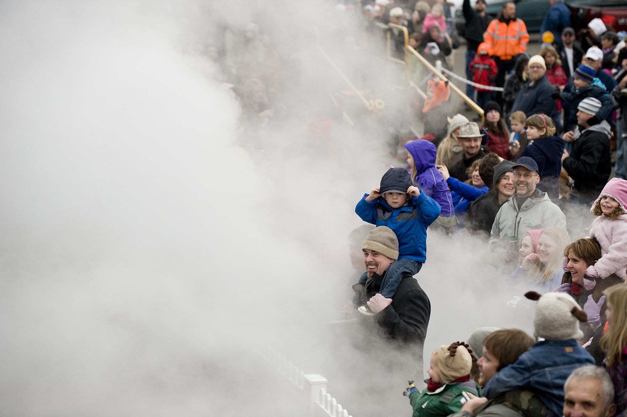George Powell, 2, and dad Mark Powell, of Vancouver, were engulfed in a cloud of steam from Santa's SP&amp;S 700 steam locomotive as it arrived Saturday morning at the Vancouver Amtrak station.