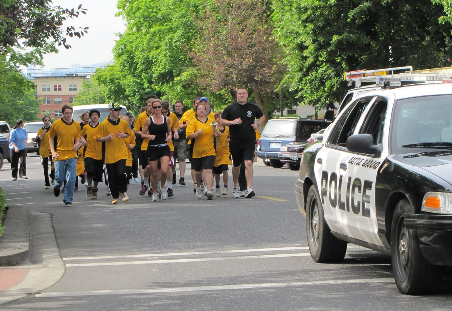 Local Special Olympics athletes and police escorts ran a torch from downtown Vancouver to the sheriff's office West Precinct near the Clark County Fairgrounds Wednesday morning.