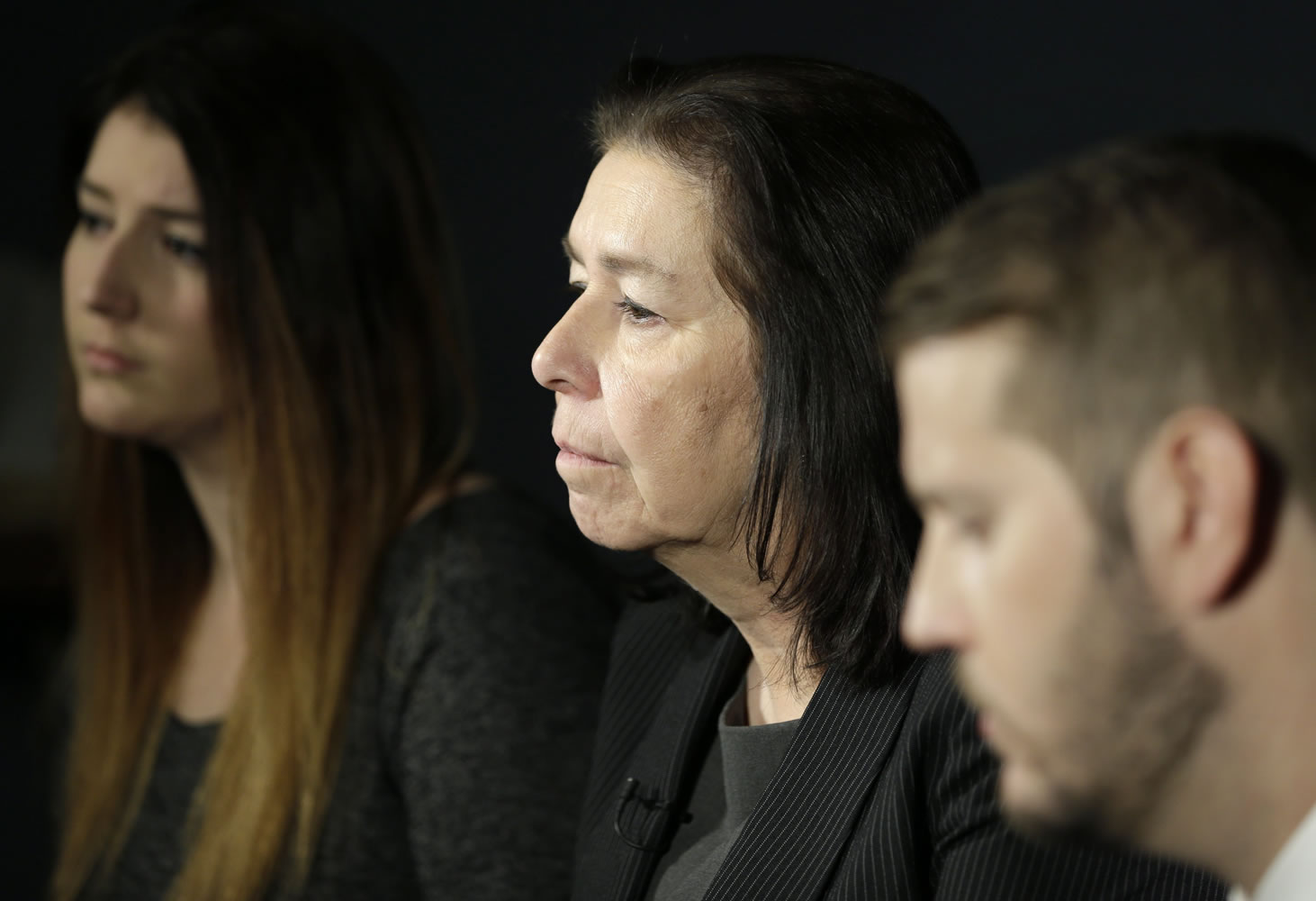 Christine Levinson, center, wife of Robert Levinson, and her children, Dan and Samantha Levinson, talk to reporters Monday in New York. Levinson disappeared in Iran in 2007.