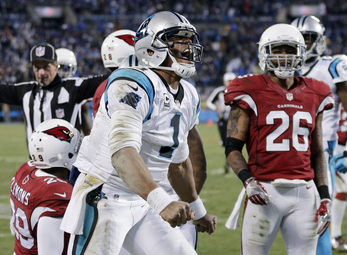 Carolina Panthers&#039; Cam Newton celebrates a first down run during the second half the NFL football NFC Championship game against the Arizona Cardinals, Sunday, Jan. 24, 2016, in Charlotte, N.C.