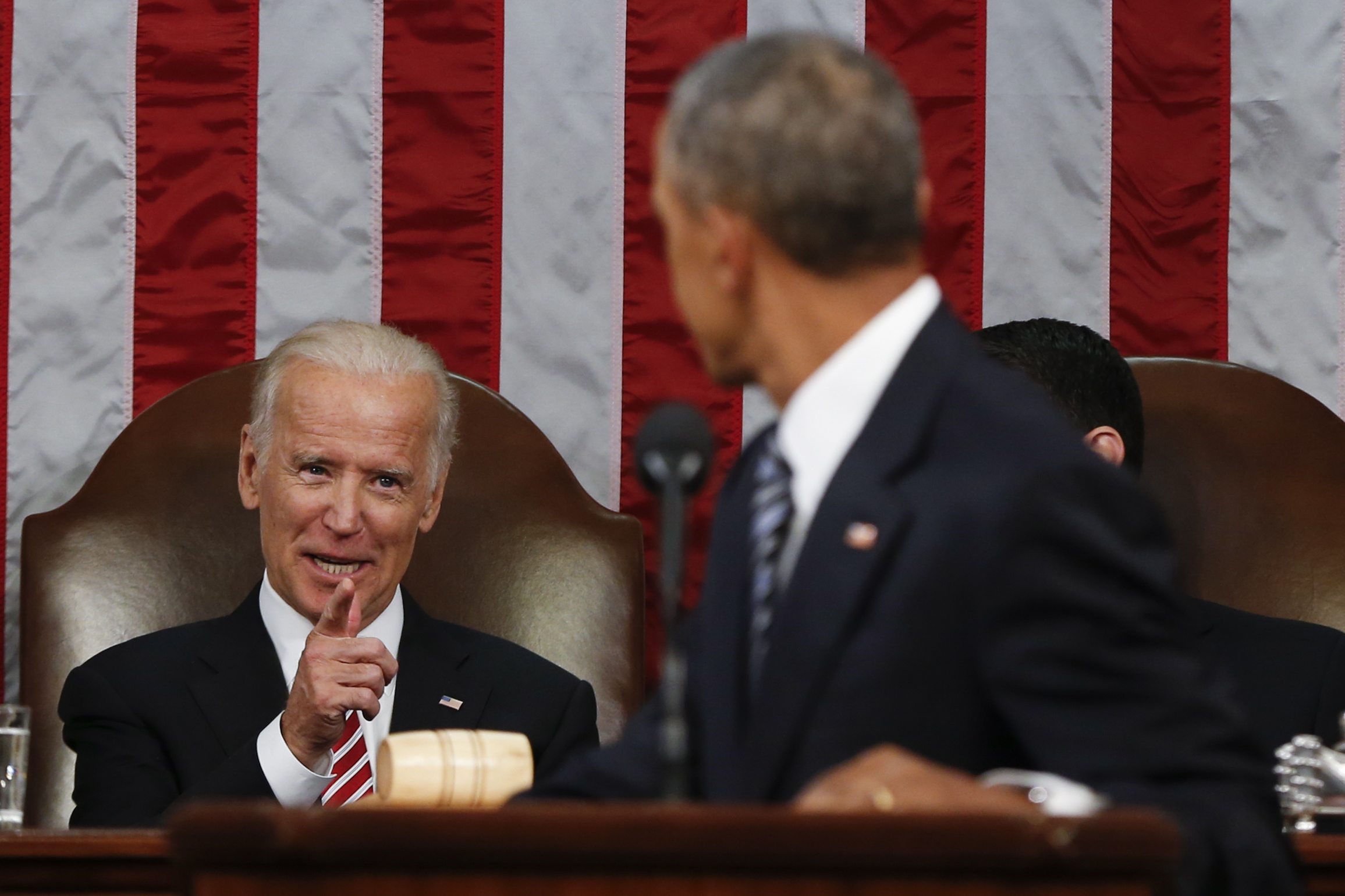 Vice President Joe Biden points at President Barack Obama during the State of the Union address to a joint session of Congress on Capitol Hill in Washington on Tuesday.