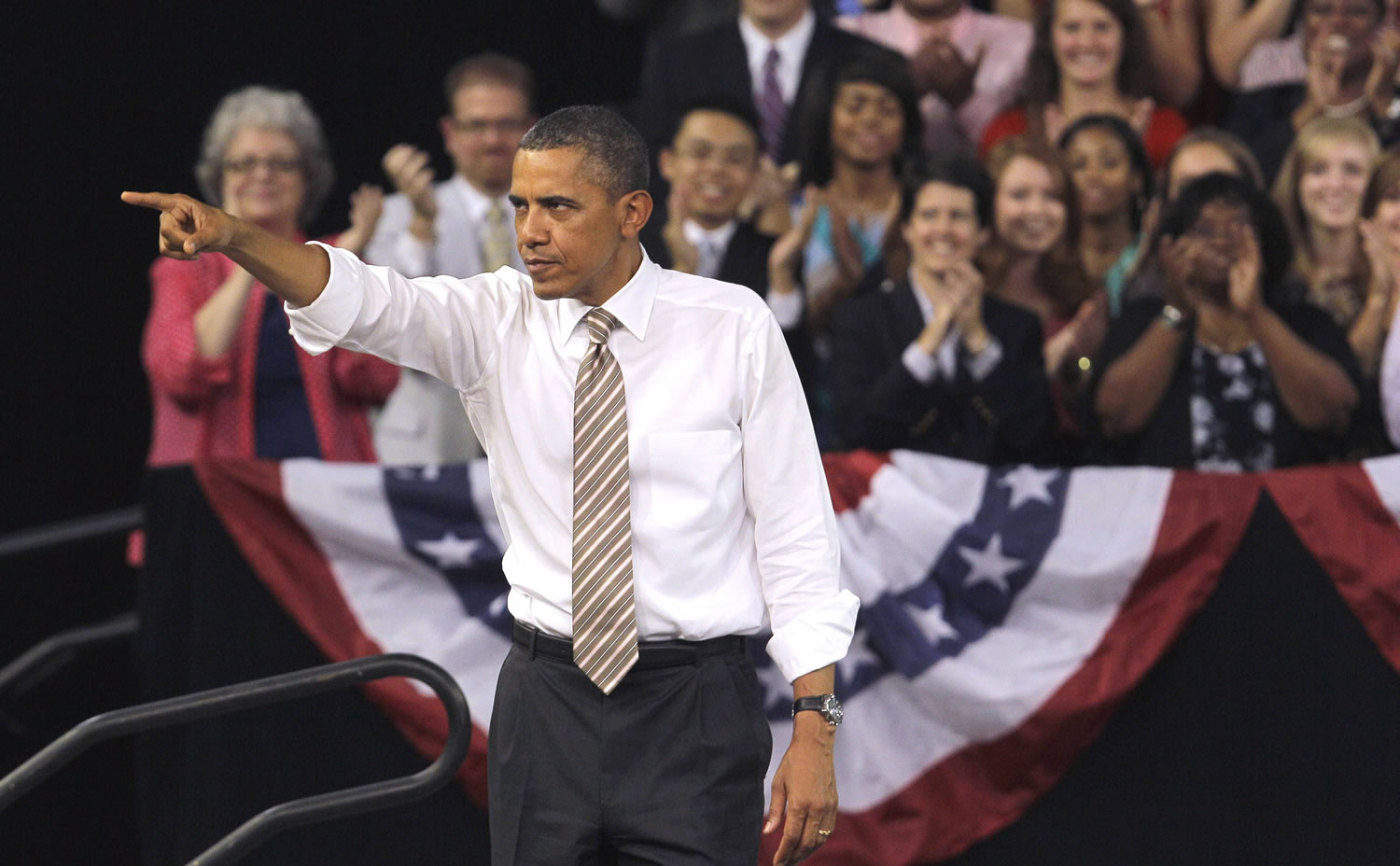 President Barack Obama points to the crowd Wednesday following his speech at North Carolina State University in Raleigh, N.C., where he spoke about the American Jobs Act.
