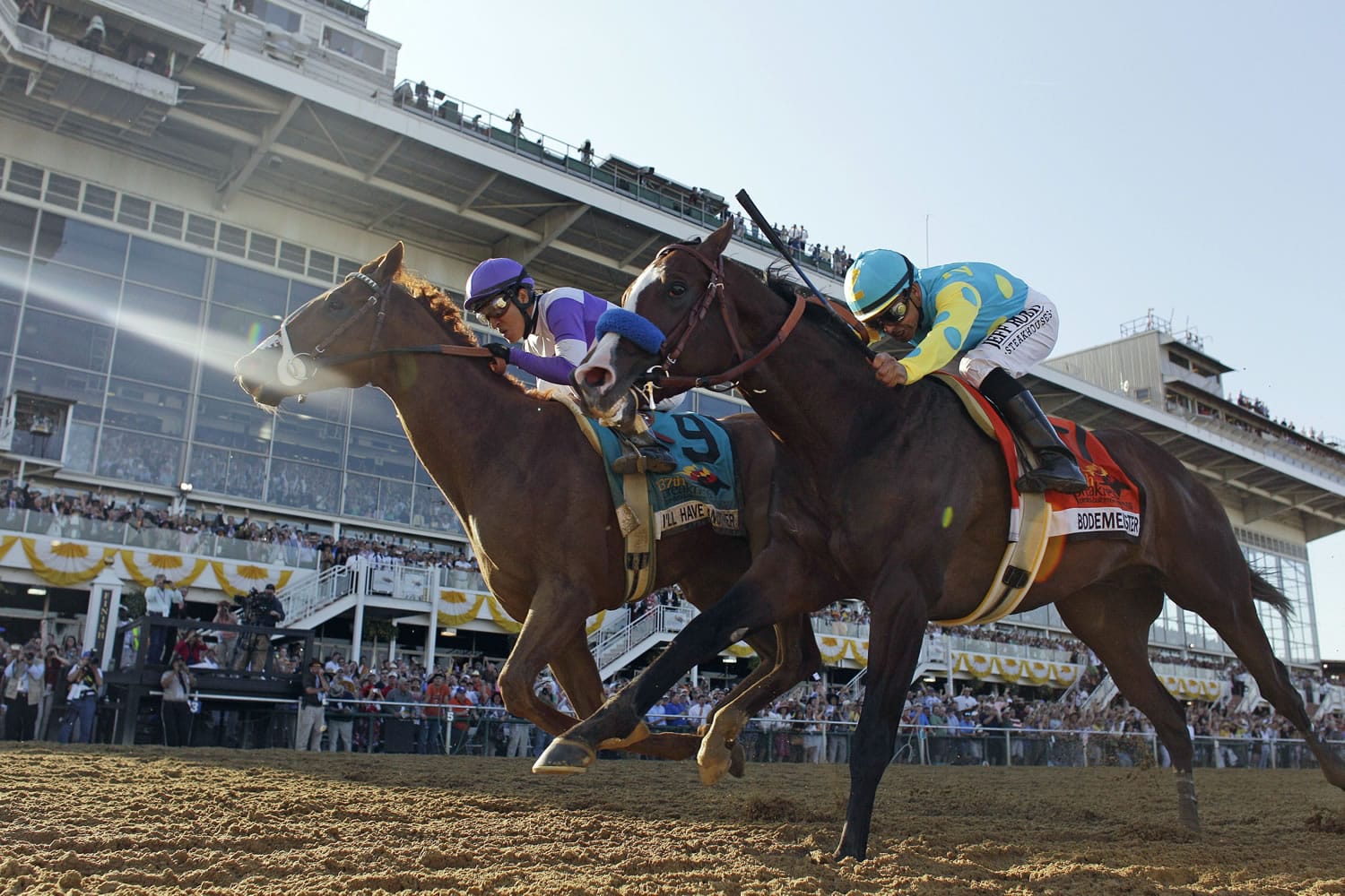 I'll Have Another (9), ridden by Mario Gutierrez, beats Bodemeister, ridden by Mike Smith, to the finish line to win the 137th Preakness Stakes horse race at Pimlico Race Course on Saturday in Baltimore.