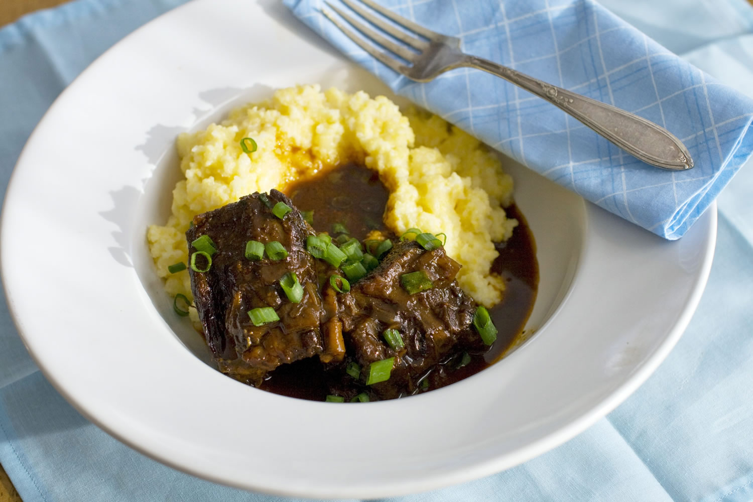 Meltingly tender Balsamic Braised Short Ribs are flavored by the caramelized vegetables that shared their pot.