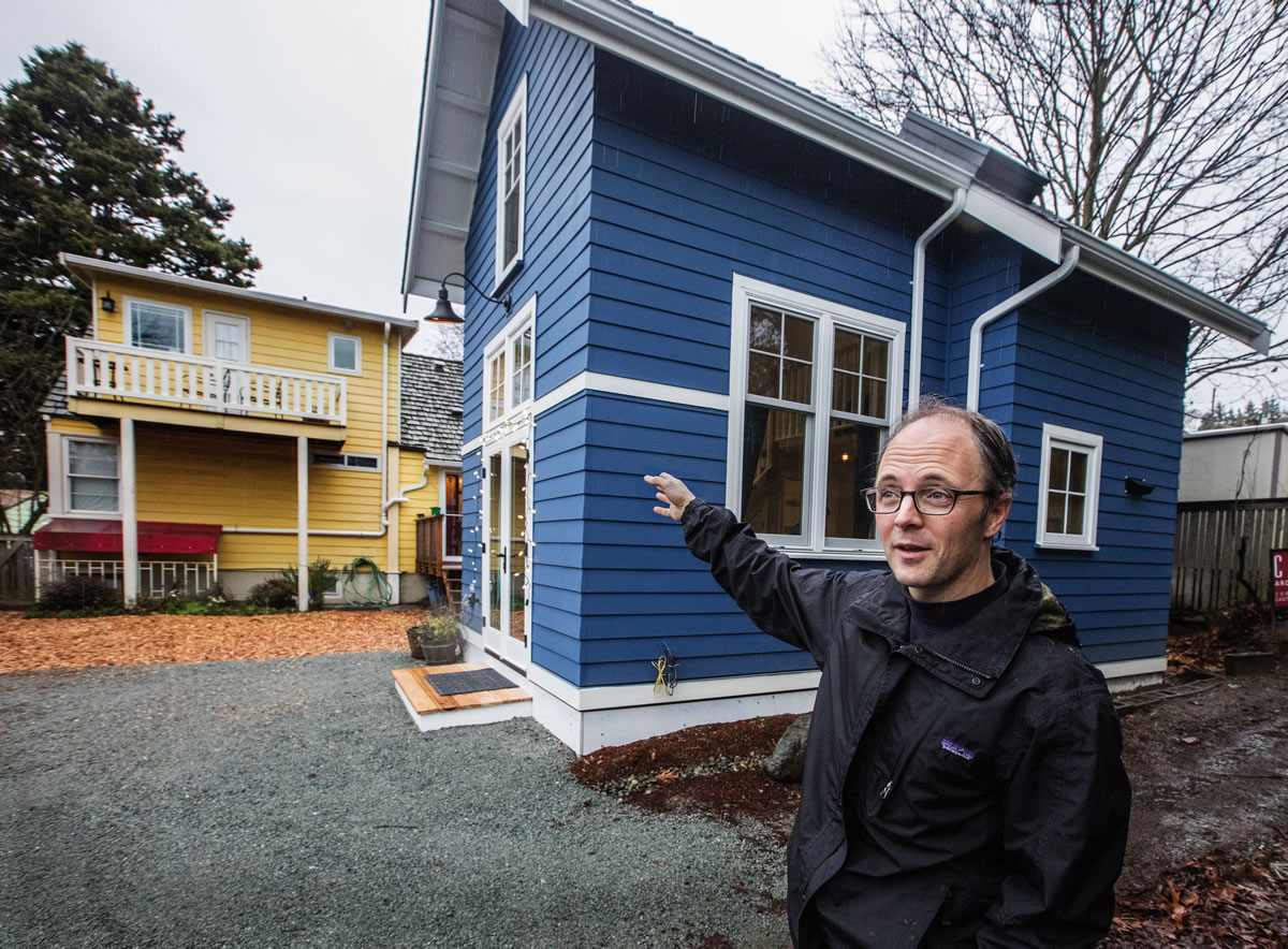 Matt Stevenson says a city parking-spot requirement added to high construction costs for the backyard cottage he and his wife will rent out in Seattle.