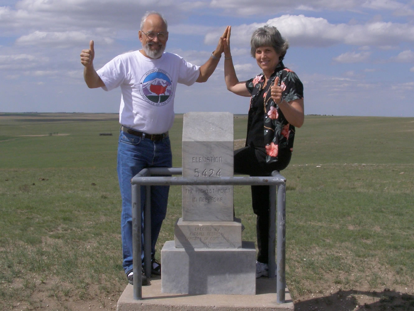 Bob and Rhonda Bolton celebrate at Panorama Point, the highest spot in Nebraska.