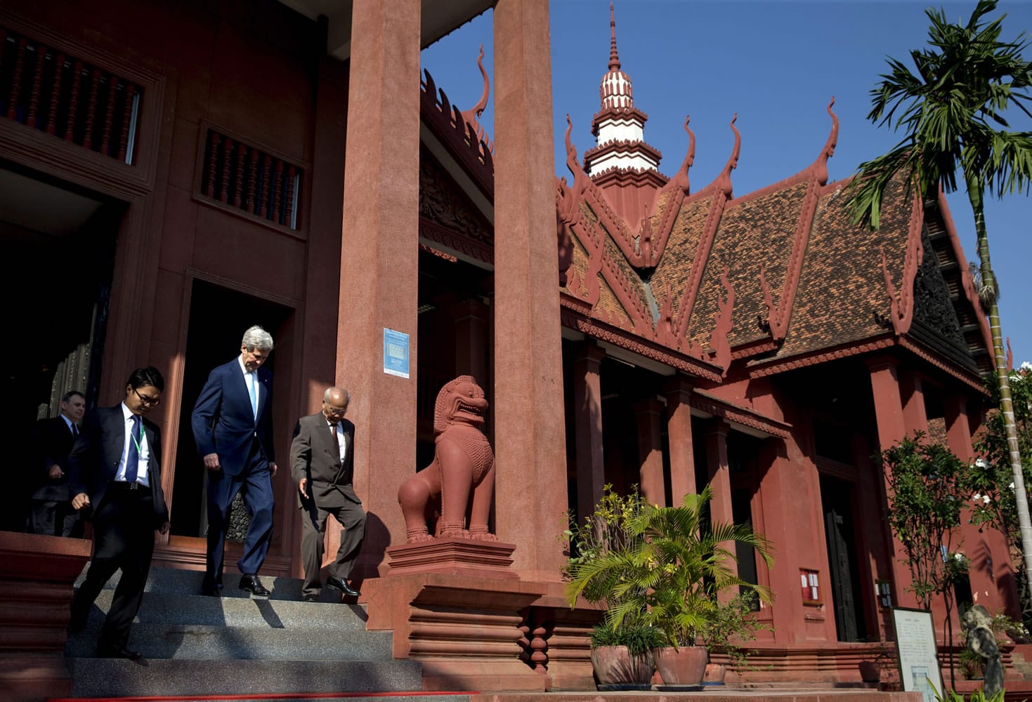 Secretary of State John Kerry, third from left, leaves a tour of the National Museum of Cambodia with Cambodian officials on Tuesday in Phnom Penh, Cambodia.