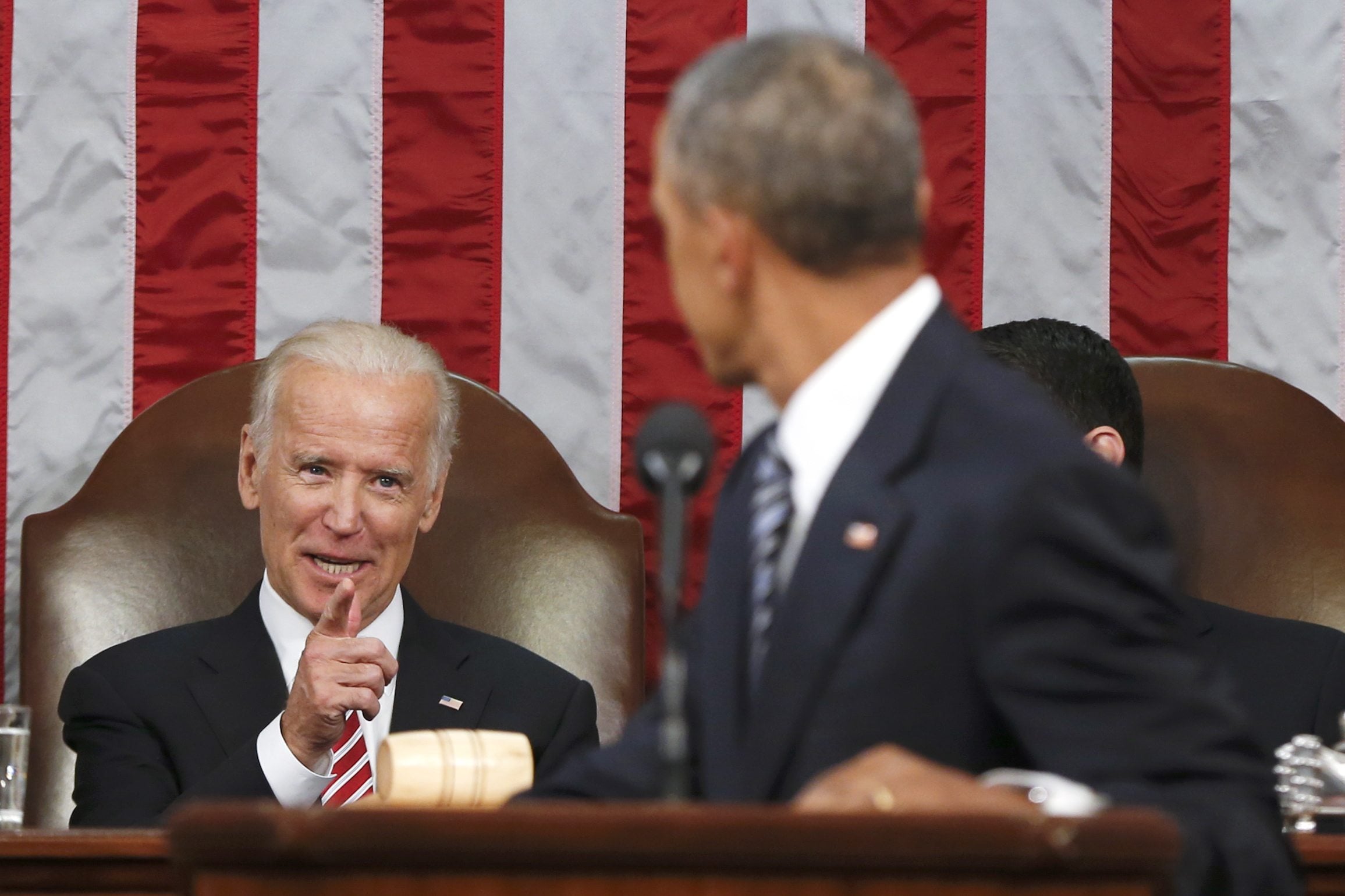Vice President Joe Biden points at President Barack Obama during the president&#039;s State of the Union address to a joint session of Congress on Tuesday on Capitol Hill in Washington.