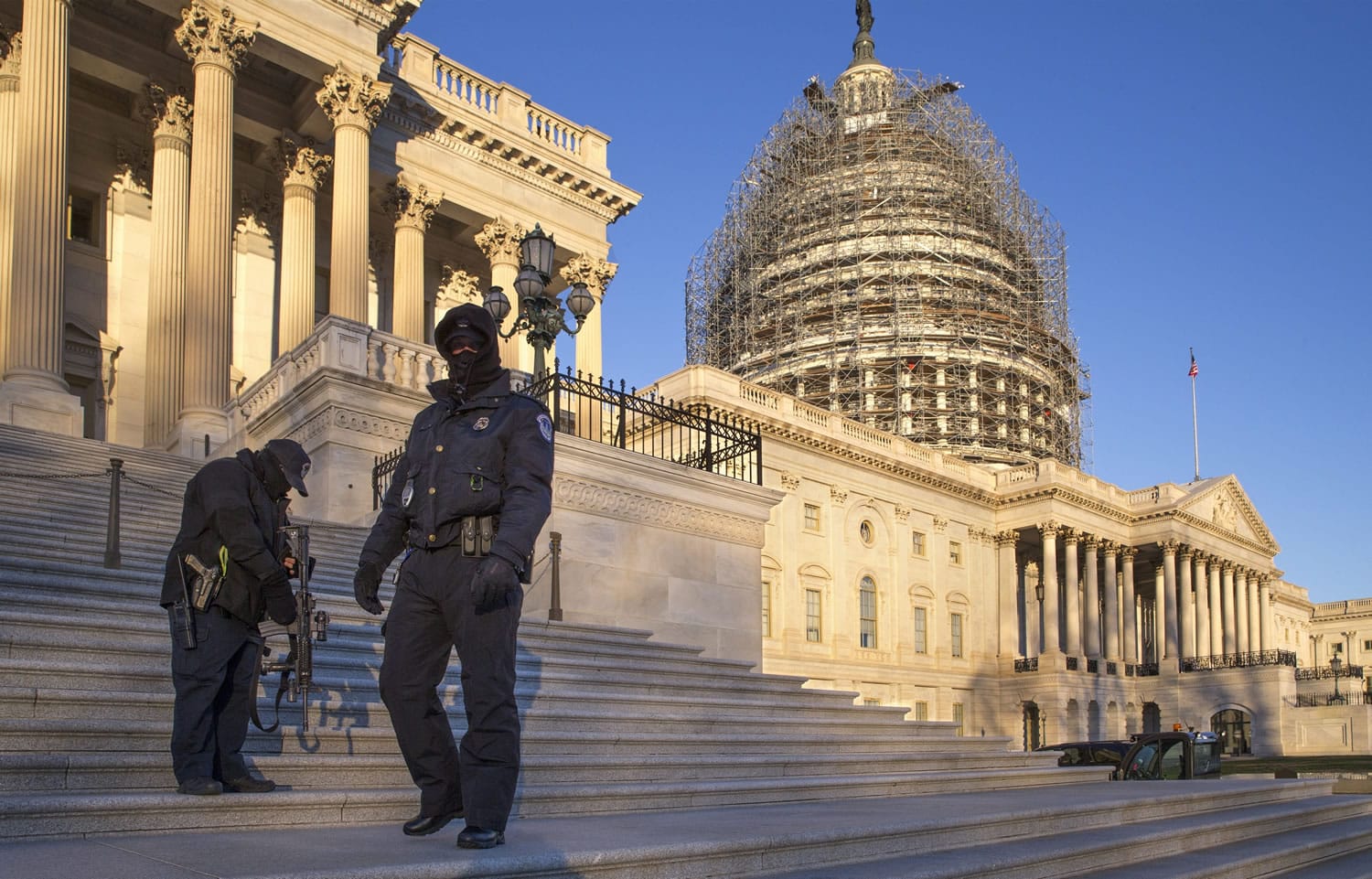 U.S. Capitol Police officers endure sub-freezing temperatures as lawmakers return to work after the holiday break on Tuesday in Washington, D.C. (J.