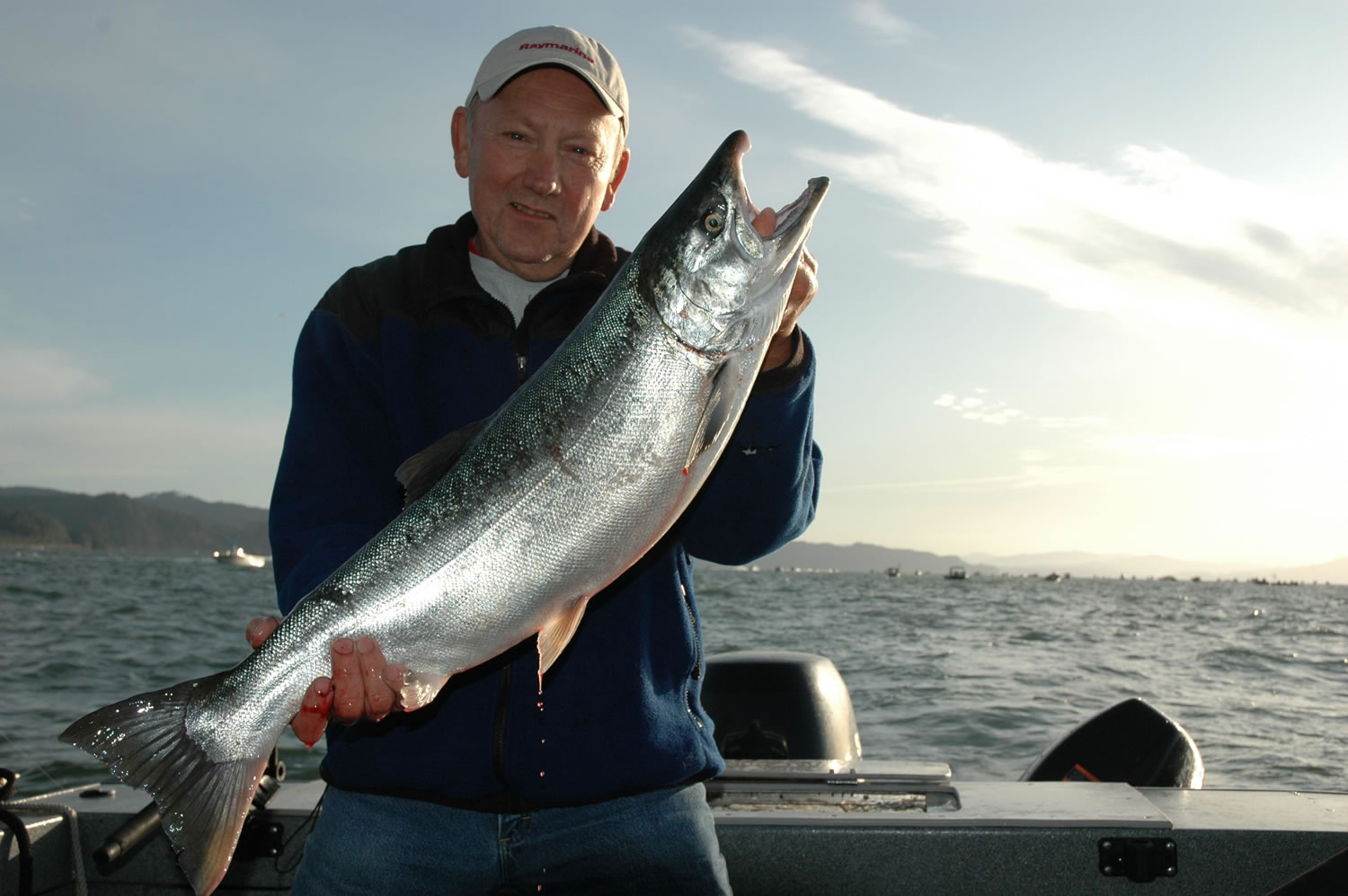 Dick Borneman of Vancouver, a top Buoy 10 angler, with a coho salmon.