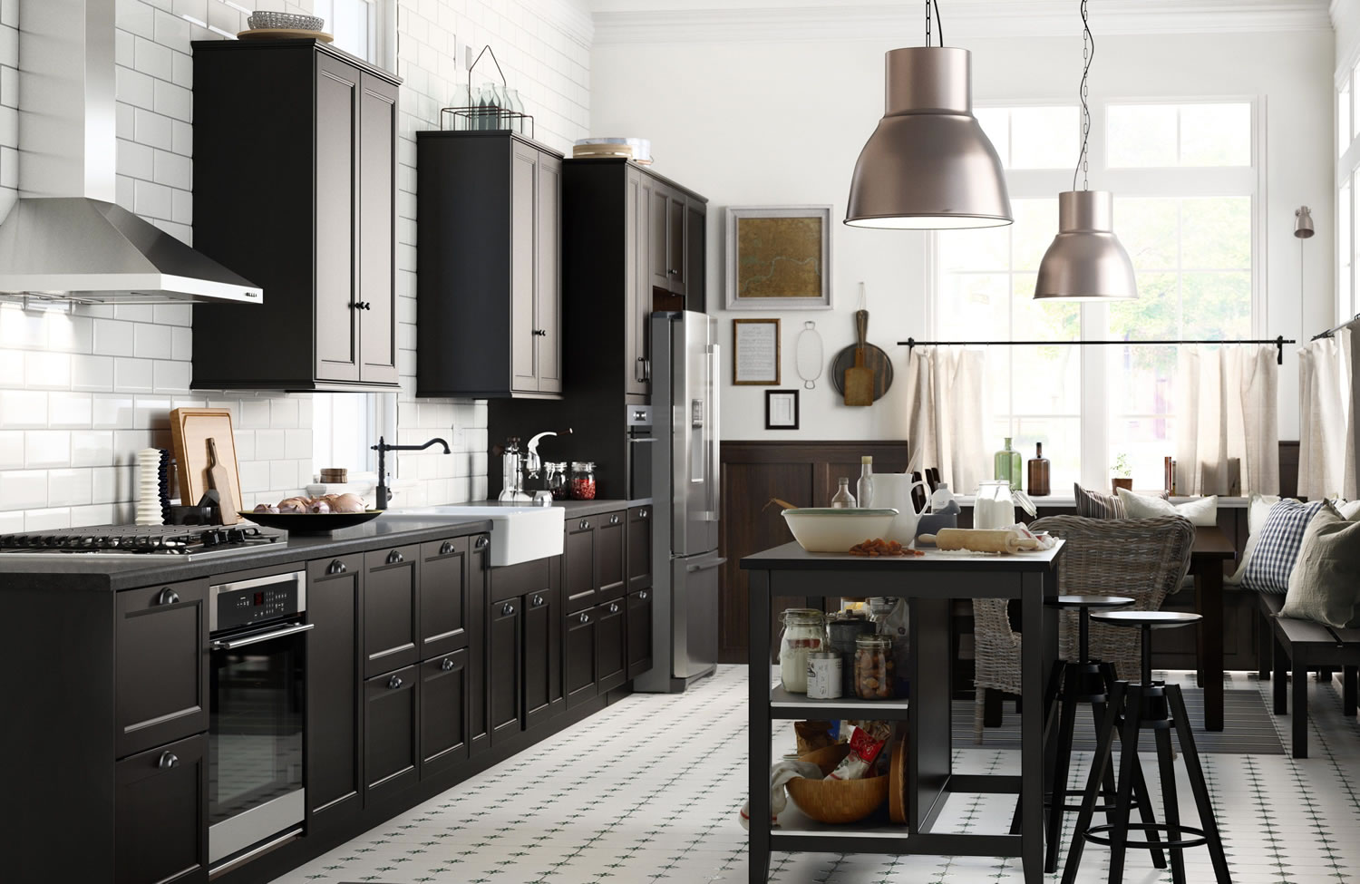 Above: The Laxarby cabinet door has a distinctly traditional look, in a warm black-brown hue. Pairing black with metallic elements, such as these big pendants lights, is trendy.