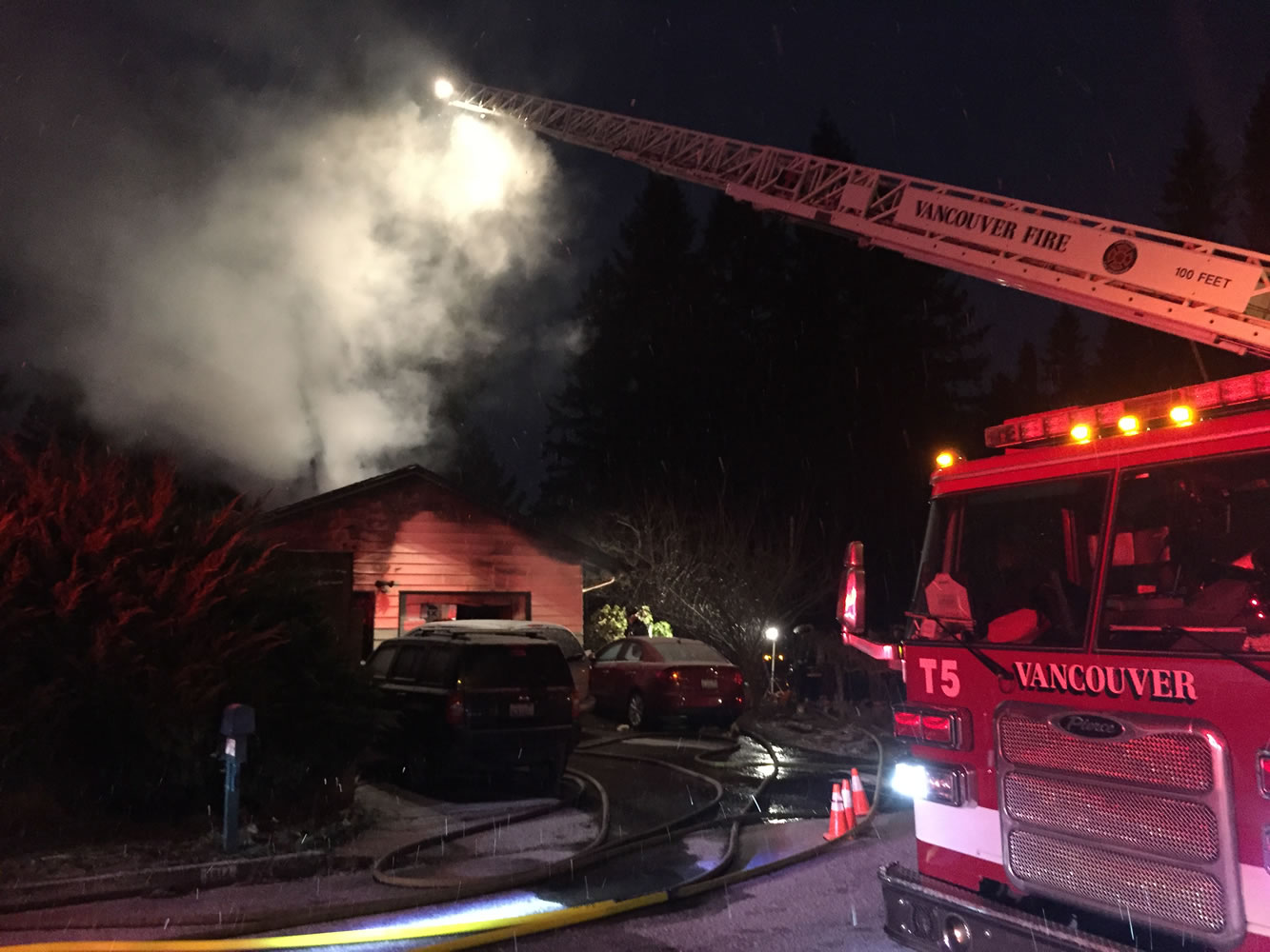 A woman was critically injured in a house fire early this morning. Firefighters rescued her from the home's garage, and she was taken to a hospital.