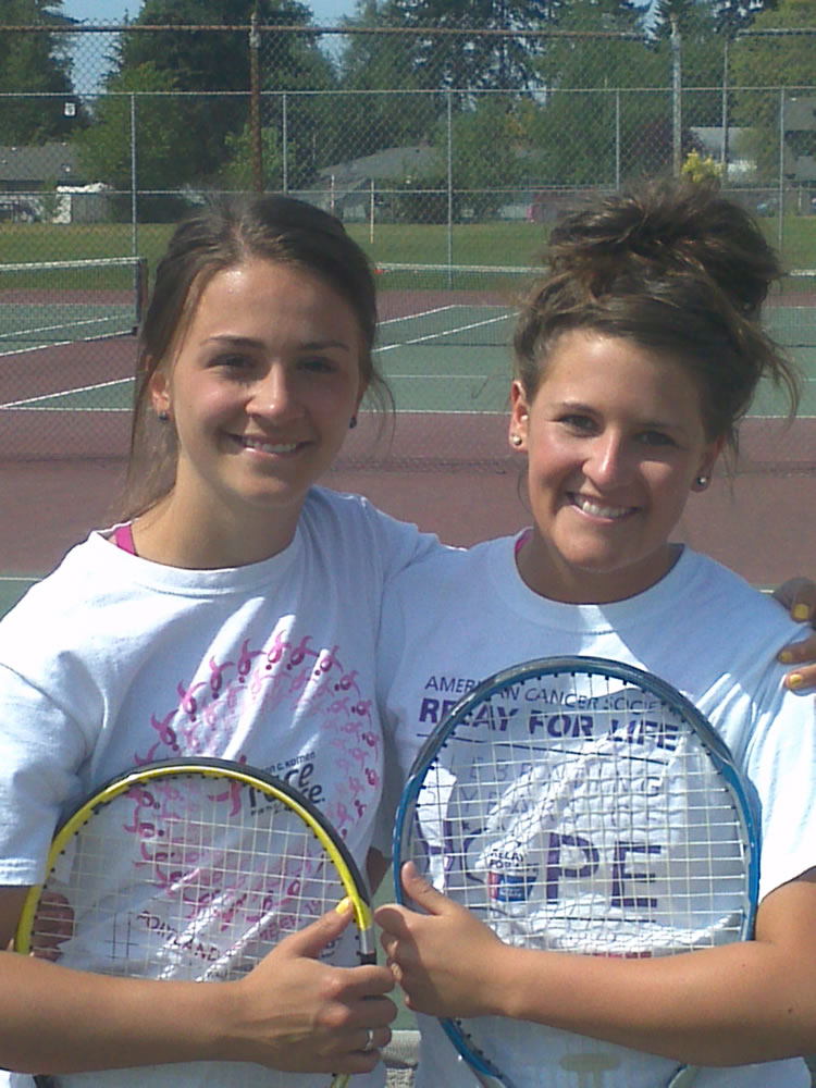 Battle Ground High School tennis doubles partners Taylor Beardall, left, and Megan Giesbers.
