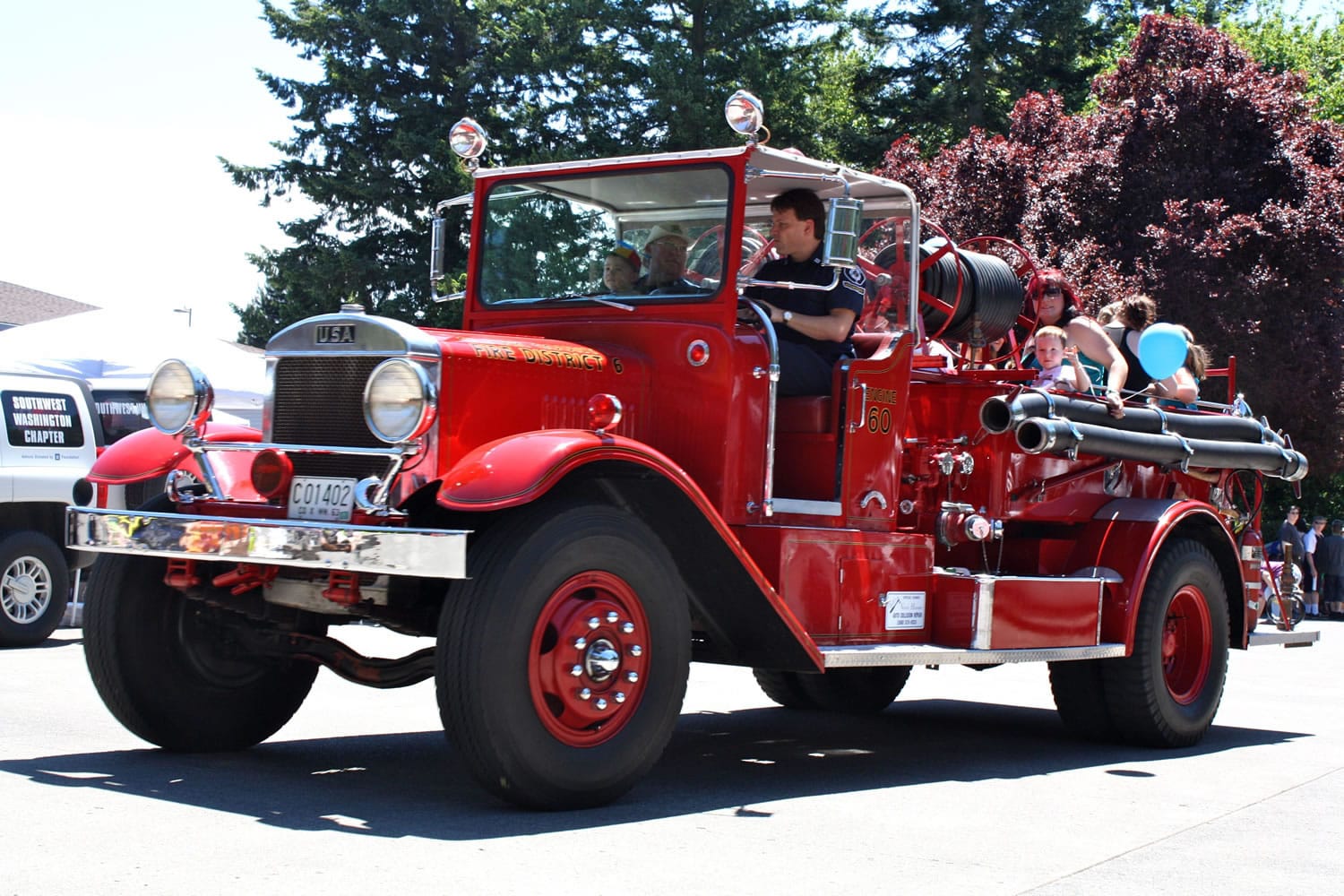 Members of Clark County Fire District 6 gave children rides in a 1940-model Halobird fire engine as part of their Saturday open house.