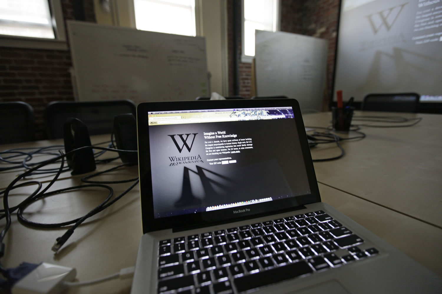 A blackout page is displayed on a computer screen Wednesday at the Wikipedia Foundation in San Francisco. Wikipedia was protesting pending U.S.