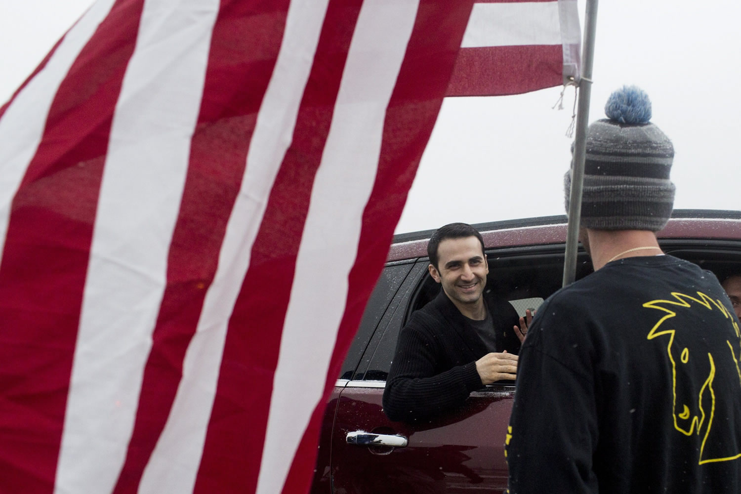 Amir Hekmati thanks the community following his return flight home on Thursday at Bishop International Airport in Flint, Mich. He returns after being imprisoned in Iran for more than four years.