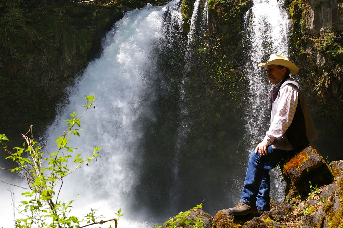 Bill Richardson of the Rocky Mountain Elk Foundation rest at Kalama Falls on the upper Kalama River.