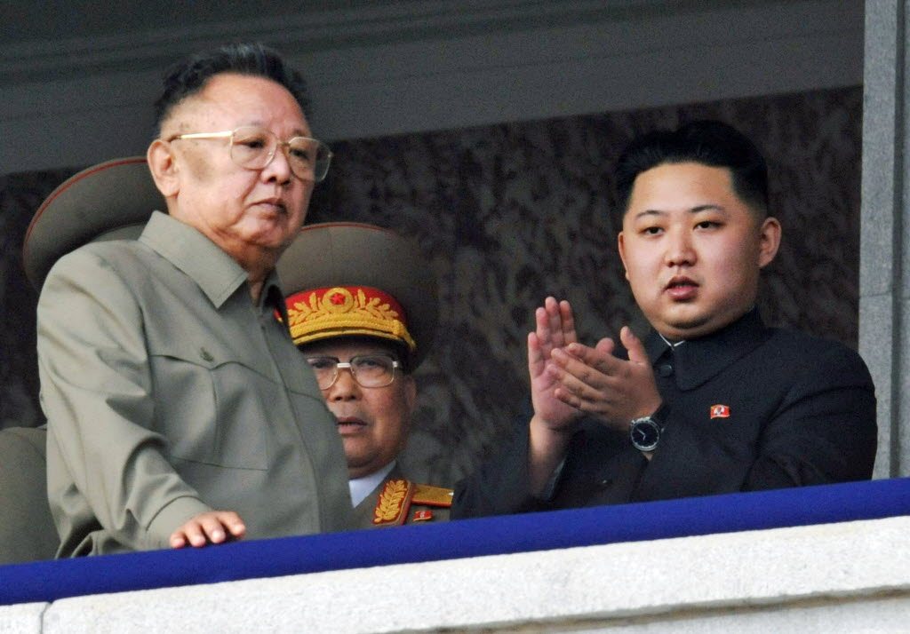 In this Oct. 10, 2010 photo Kim Jong Un, right, along with his father and North Korea leader Kim Jong Il, left, attends during a massive military parade marking the 65th anniversary of the ruling Workers' Party in Pyongyang, North Korea.