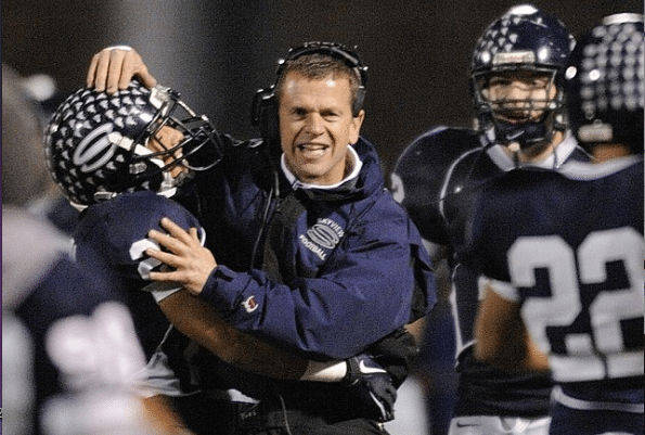 Head football coach Steve Kizer of Skyview High School celebrates a defensive touchdown against Kentwood High School during the second half Friday November 11, 2011 in Vancouver, Washington. Skyview beat Kentwood 34-7.