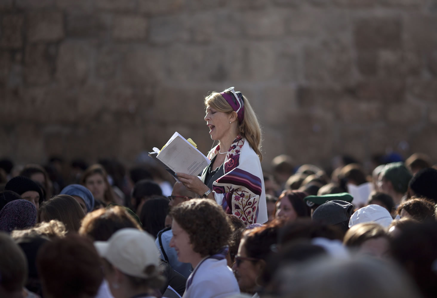 A Jewish woman prays at the Western Wall in Jerusalem&#039;s Old City. Israeli Prime Minister Benjamin Netanyahu is advancing a plan to allow non-Orthodox Jewish prayer at the Western Wall, a move advocates say would mark government support for liberal streams of Judaism.