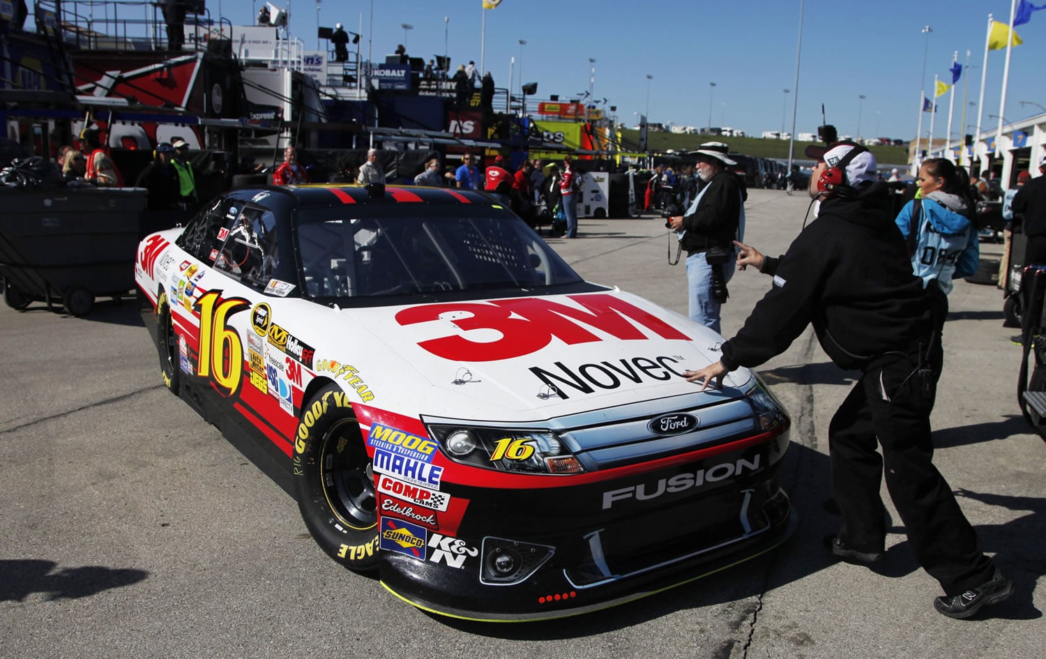 Greg Biffle (16) pulls out of the garage during practice for the NASCAR Sprint Cup Series auto race at Kansas Speedway in Kansas City, Kan., on Friday.
