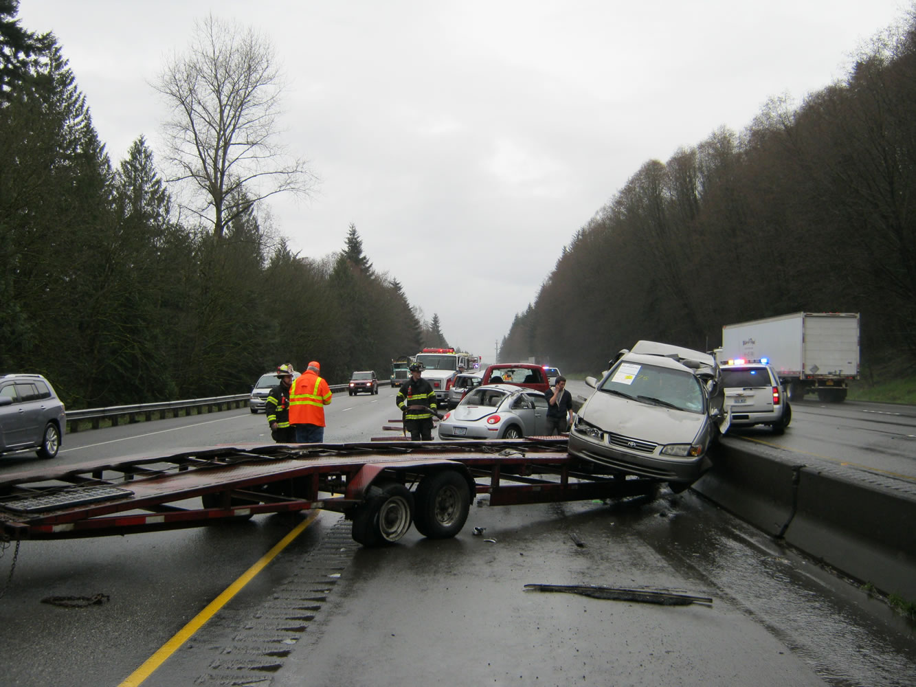 A Battle Ground driver lost control of a Ford F-250 and trailer, dumping two towed cars on Interstate 5 south of Chehalis Tuesday morning.