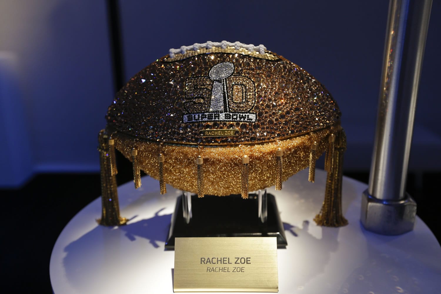 A Rachel Zoe designed football is displayed at the unveiling of the CFDA Footballs Jan. 20 at the NFL headquarters in New York.  In celebration of Super Bowl 50 and in support of the NFL Foundation, the NFL and the Council of Fashion Designers of America have collaborated on 50 Bespoke Designer Footballs created by CFDA Members.