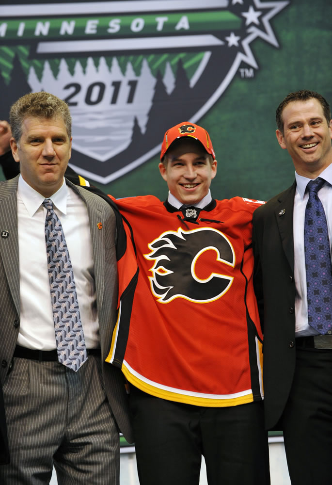 Portland Winterhawks' Sven Bartschi poses on stage after he was drafted in the first round by the Calgary Flames in the National Hockey League entry draft on Friday.