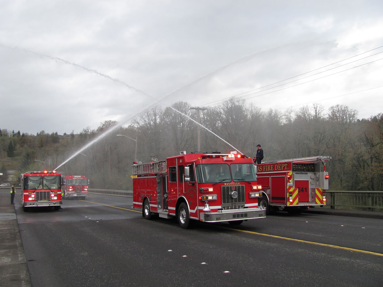 Crews from East County Fire and Rescue and the Camas Fire Department greeted the newest addition to the Washougal Fire Department with a water cannon salute on the Third Avenue Bridge Friday morning. The 2010 Sutphen engine, which cost approximately $400,000, was purchased with fire impact fees.