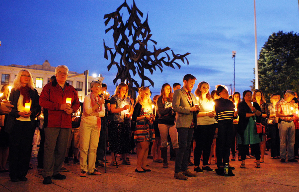Boston University students and faculty members hold a candlelight vigil on Marsh Plaza at Boston University, Saturday, May 12, 2012, for three students studying in New Zealand who were killed when their minivan crashed during a weekend trip. At least five other students were injured in the accident, including one who was in critical condition. Boston University spokesman Colin Riley said those killed in the accident were Daniela Lekhno, 20, of Manalapan, N.J.; Austin Brashears, 21, of Huntington Beach, Calif.; and Roch Jauberty, 21, whose parents live in Paris.