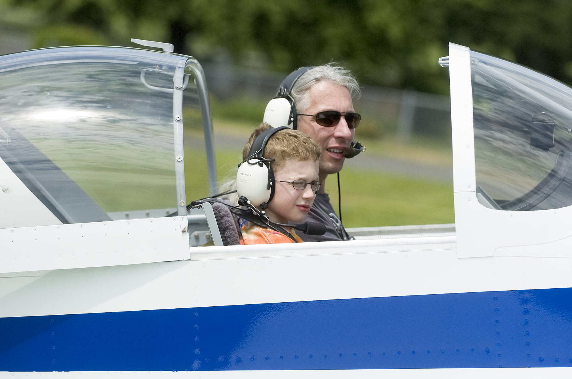 Daniel Conway, 8, from Vancouver, and pilot Gus Funnell taxi to the runway for a free ride at a past Pearson Air Museum's Open Cockpit Day.