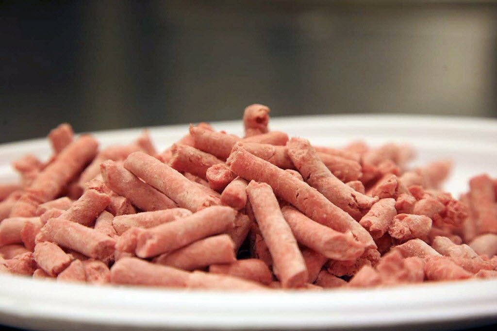 Pink slime,&quot; a term for &quot;lean, finely textured beef,&quot; describes the fatty meat trimmings that are heated, treated with ammonia hydroxide and commonly mixed into ground beef. U.S.